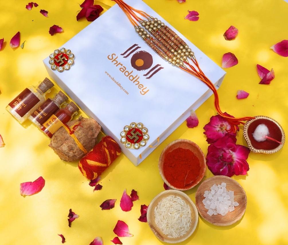 Orange Golden Dora Rakhi All in one Hamper